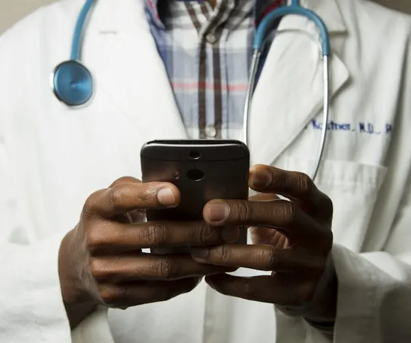 doctor holding a smart phone